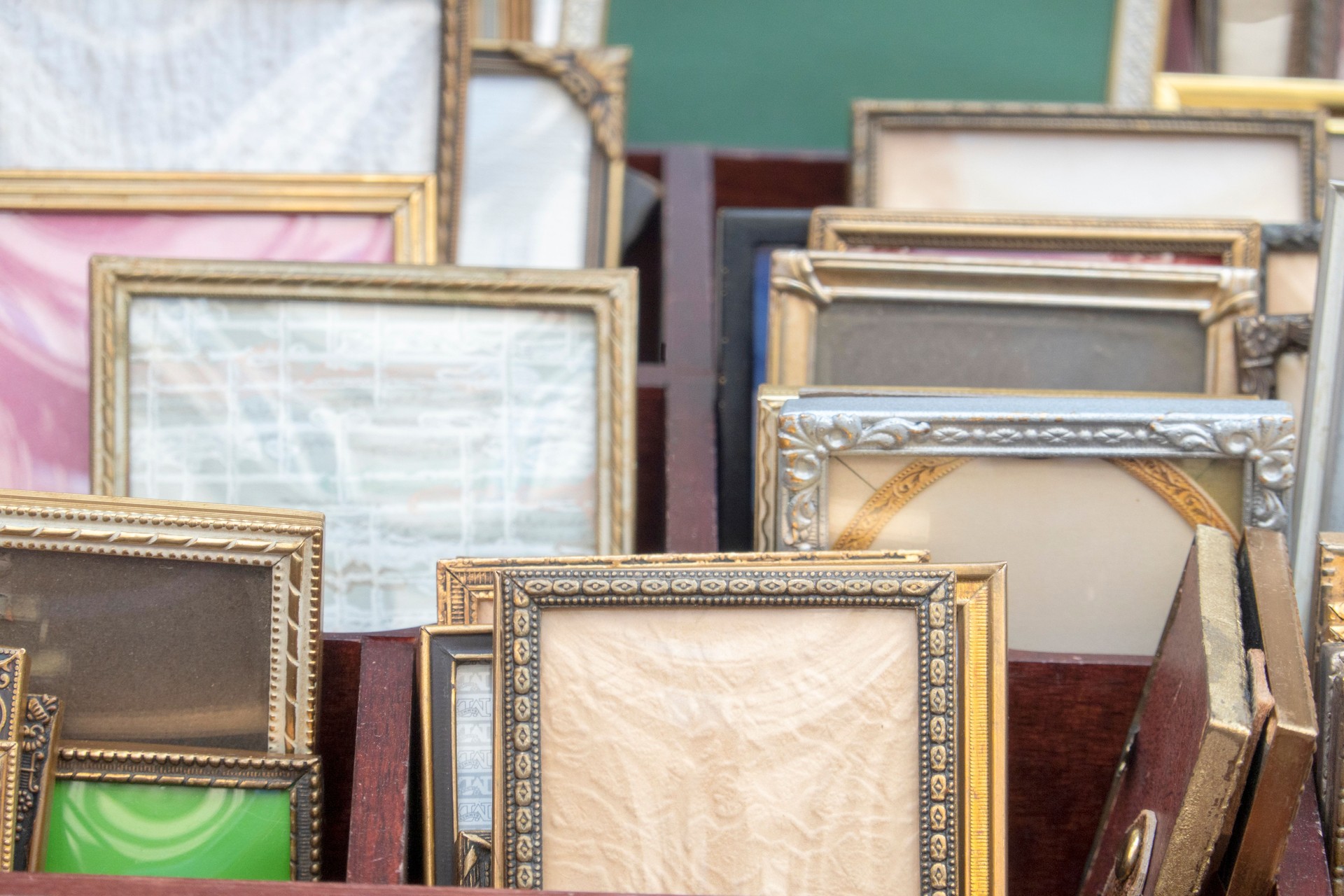 Collection of small old picture frames at the flea market